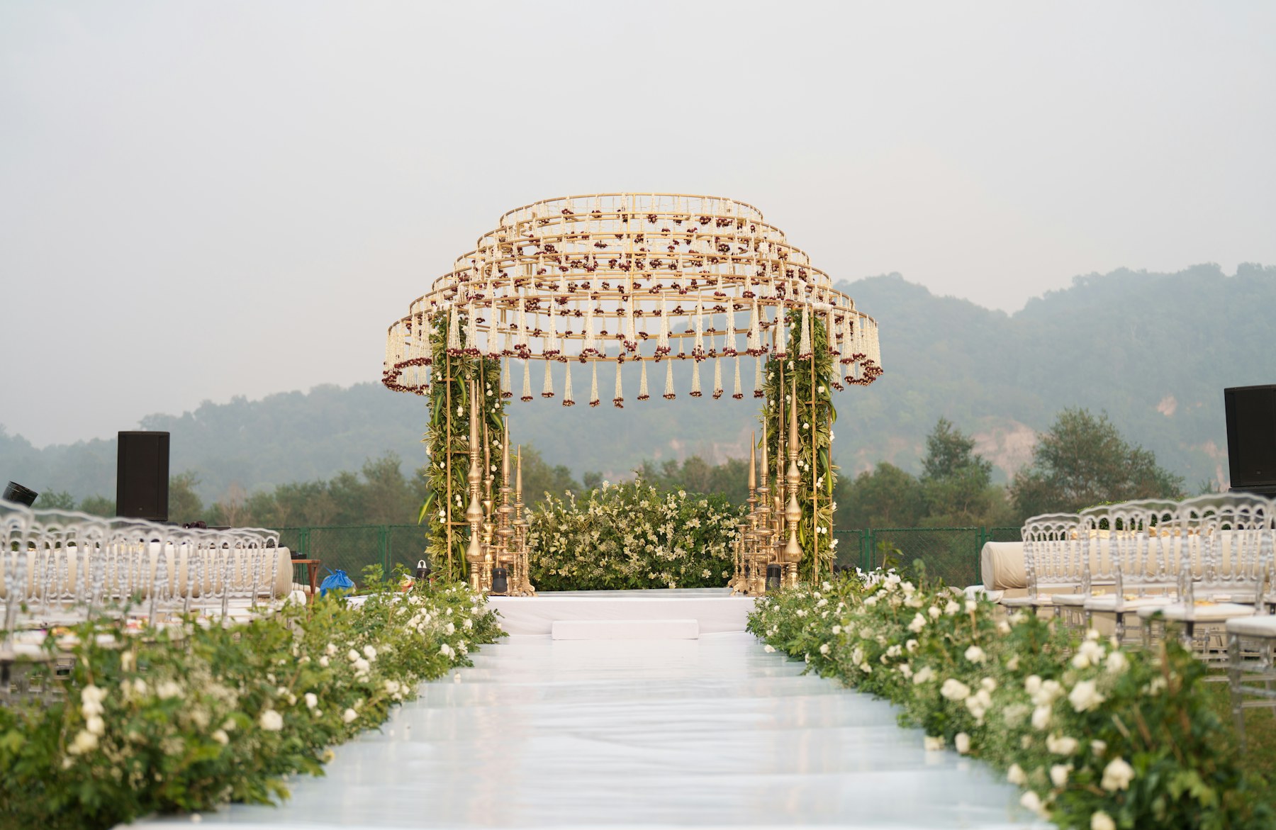 Elegant floral wedding aisle and ceremony decor